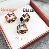 H BLACK CERAMIC LOGO CUT ROSE GOLD RING