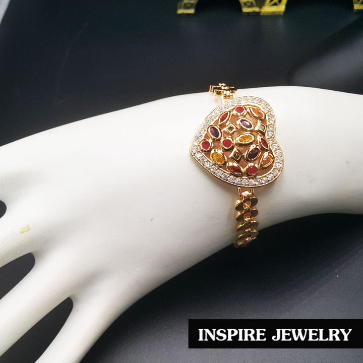 inspire-jewelry-สร้อยข้อมือกึ่งกำไล-ฝังพลอยนพเก้า-และล้อมด้วยฝังเพชรสวิส-สวยงามมาก-งานแฟชั่นชั้นนำ