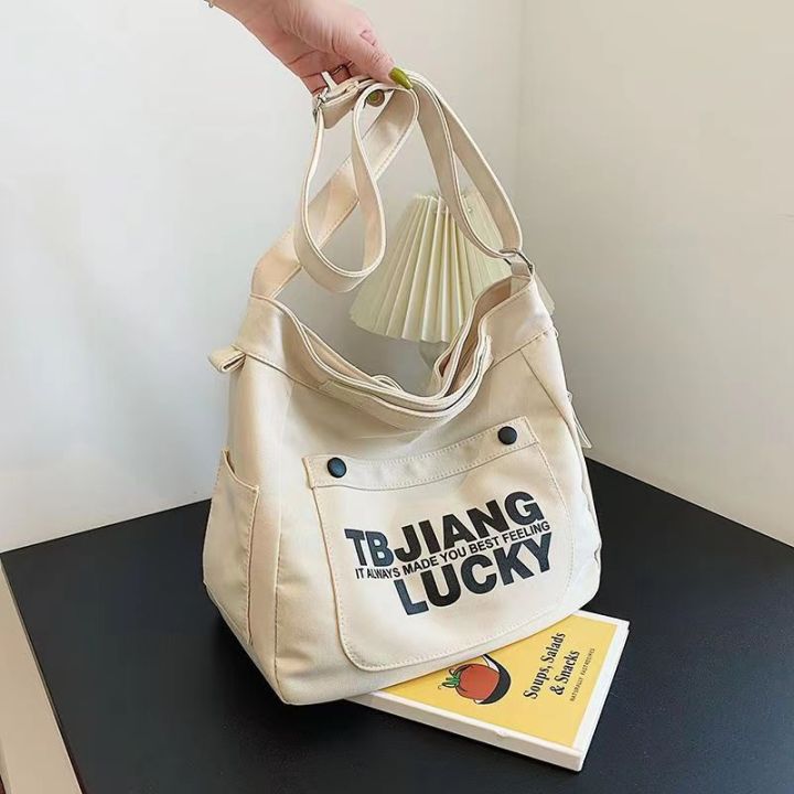 กระเป๋า-bag-กระเป๋าสะพายข้างผู้ชายแบรนด์น้ำฮาราจูกุกระเป๋าสะพายข้างนักเรียนชั้นเรียนกระเป๋าสะพายลำลองญี่ปุ่นหญิง