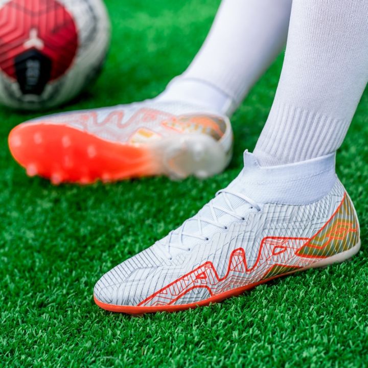 รองเท้าฟุตบอลแฟชั่นคุณภาพสูงสำหรับผู้ชายผู้หญิงรองเท้าฟุตซอลฟุตบอลมืออาชีพสตั๊ดยาว