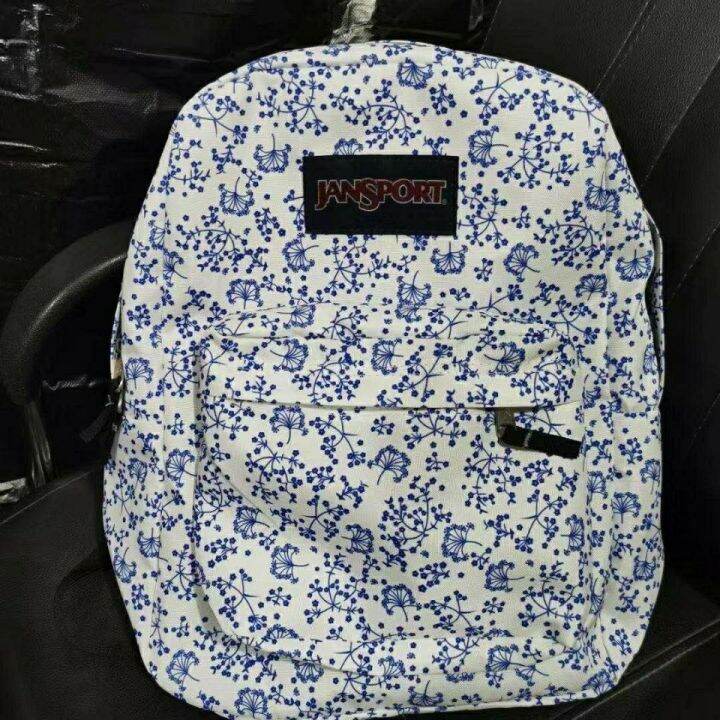 JanSport ดอกไม้ใหม่ Jesber 2021 ปีกระเป๋าสะพายกระเป๋าแฟชั่นชายสีฟ้าและ