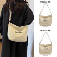 Summer large-capacity commuting white tote bag female 2023 new all-match simple messenger Japanese canvas bag male 【QYUE】