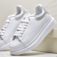 Alexander McQueen  white shoes with increased white ash.