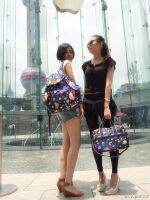 Lesportsac 2023 กระเป๋าผู้หญิงความจุขนาดใหญ่แมวน่ารักพิมพ์กระเป๋าเป้สะพายหลังกระเป๋านักเรียนกระเป๋าเดินทาง7839