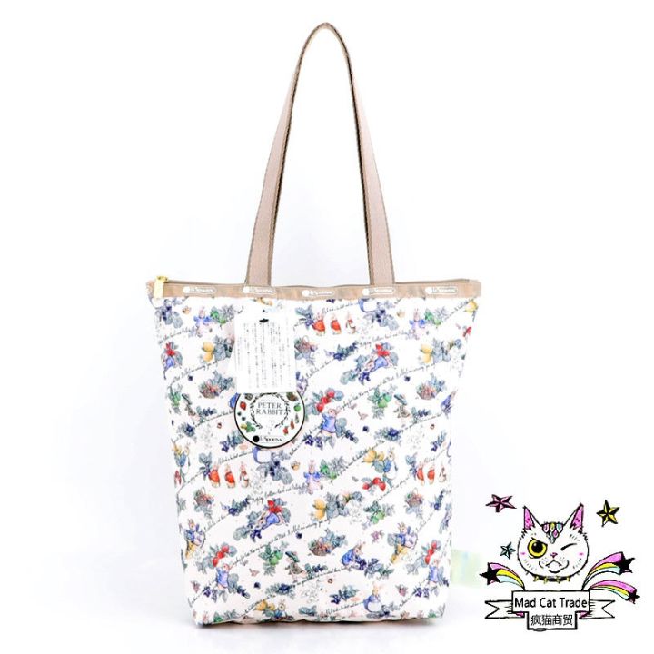 lesportsac-สินค้าใหม่-x-girl-joint-casual-casual-น้ำหนักเบาไหล่เดียวแบบพกพาผ้ากระเป๋ารุ่นแนวตั้ง-2432-g712