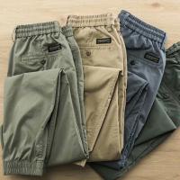 กางเกงคาร์โก้ขายาวสำหรับผู้ชายกางเกงฟิตเนสเอวยืดหยุ่นสายรูดลำลองผ้ายืดกระเป๋าหลากหลาย