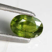 0.65 ct เขียวส่อง (Green Sapphire) สีเขียว เหลือง ทรงไข่