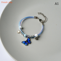 Fresh sky สร้อยข้อมือลูกปัดจี้โลหะรูปผีเสื้อสำหรับผู้หญิงเด็กผู้หญิงสร้อยข้อมือเชือกทอแบบปรับได้หลากสีของขวัญสำหรับงานเลี้ยงวันเกิด