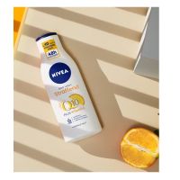 New version of German nivea Nivea Q10 firming essence body milk moisturizing to orange peel 400m l VC