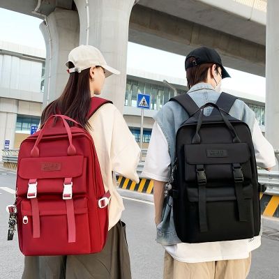 [Export from Japan and South Korea] Multi-functional student schoolbag 2023 new junior high school student waterproof backpack with large capacity hand-raised shoulders tide