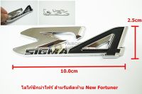 ป้ายโลโก้พลาสติกสีดำ SIGMA4สำหรับติดท้าย Toyota Fortuner ขนาด 10.0x3.0 cm ติดตั้งด้วยเทปกาวสองหน้าด้านหลัง