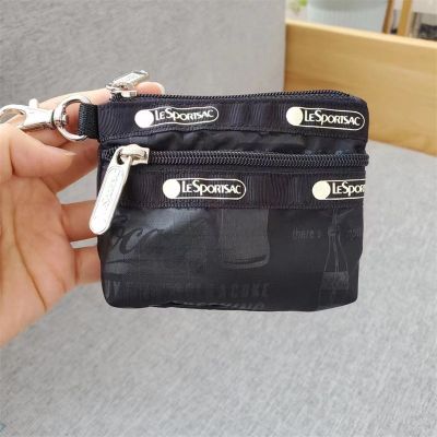 FM Lesportsac ใหม่น่ารักมินิตะขอกระเป๋าลิปสติกกระเป๋าการ์ตูนกระเป๋าเอกสารกระเป๋าหูฟังสีดำโค้ก 3394