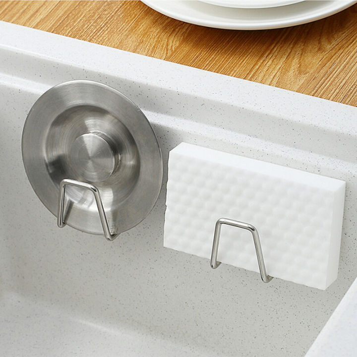 ซื้อ-1-แถม-1-ห้องครัวสแตนเลสอ่างล้างจานฟองน้ำชั้นวางกาวตนเองท่อระบายน้ำครัวติดผนังอุปกรณ์จัดเก็บข้อมูล