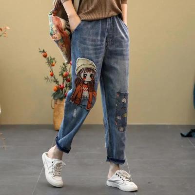 [Spot] cartoon girl paste cloth embroidery jeans womens loose large size large pocket elastic waist harem pants 2023