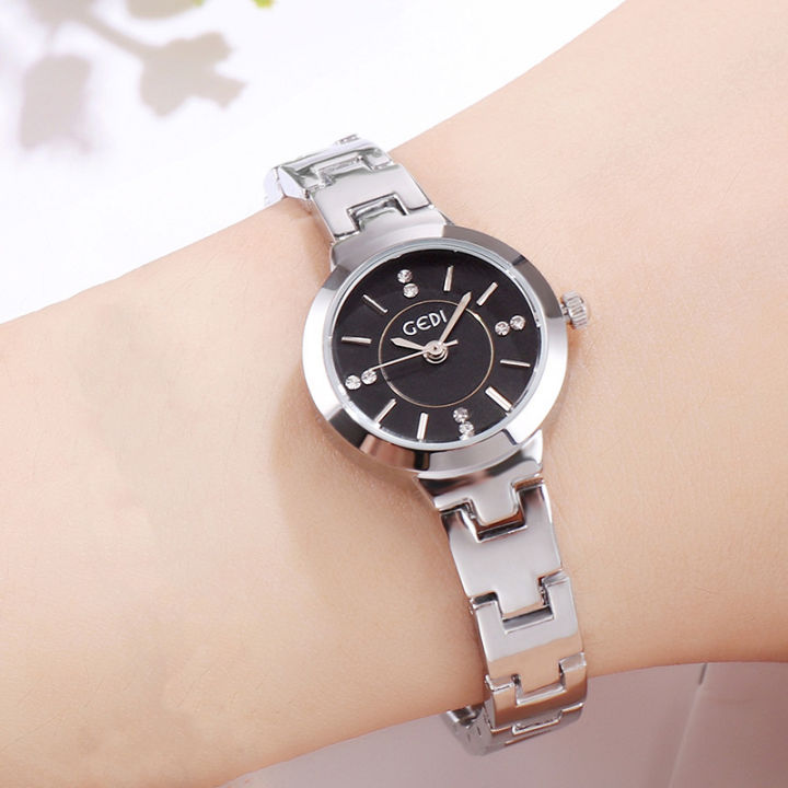 นาฬิกาควอตซ์กันน้ำทันสมัยสำหรับนักเรียนนาฬิกาผู้หญิงสายรัดเหล็กนาฬิกาผู้หญิงระดับไฮเอนด์ที่เรียบง่าย