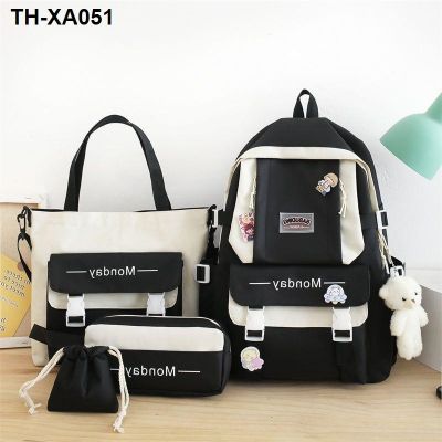 Four-piece schoolbag female primary school backpack fashion contrast wild forest large capacity five six junior high