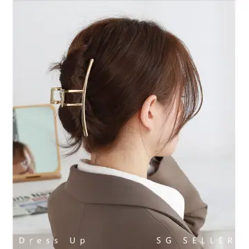 Giant hair clip on sale trend