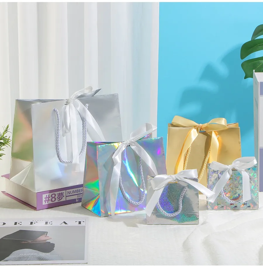 Laser gift paper bag holiday party gold and silver packaging carton ribbon small  paper bag