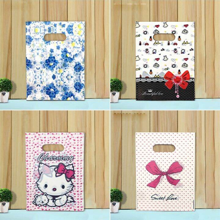 50pcs-15x20cm-20x30cm-small-jewelry-bag-cute-pattern-plastic-bag-with-handle-gift-bags-candy-cookie-party-favor-packaging-bag