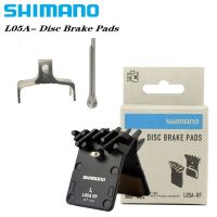 Shimano ผ้าเบรก L05A DEORE SLX XT เรซินแผ่นโลหะครีบระบายความร้อนน้ำแข็งเทคภูเขาถนน R9170 R8070 R7070 RS805 RS505ของแท้