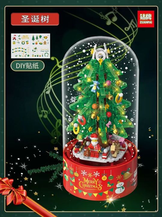 ของขวัญคริสต์มาสกล่องดนตรีอนุภาคขนาดเล็กประกอบบล็อกตุ๊กตาหิมะต้นคริสต์มาสบ้านขนมหมุนอัตโนมัติหิมะ
