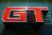 จีที โลโก้ ติดกระจังหน้ากระจัง โตโยต้า  โคโรล่า Gt front grille logo, size 3.5 x 8.3 cm. Attached to the front grille TOYOTA COROLLA KE70