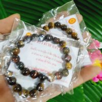 กำไลข้อมือพลอยตาเสือ Tiger Eye พร้อมคาถาบูชา นำเข้าพิธีปลุกเสกบูชาแล้วเสริมสิริมงคล เป็นเครื่องประดับมหามงคล