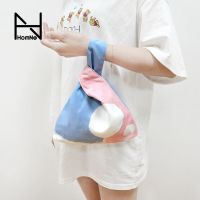 Original Japanese abstract cosmetic bag small capacity coin bag mobile phone bag splicing color block canvas wrist bag H 【BYUE】