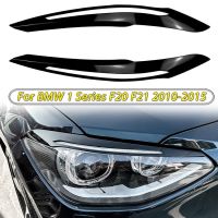 }{”:》ขอบไฟหน้าคิ้วเปลือกตารถยนต์สีดำเงา2ชิ้นสติกเกอร์สำหรับ BMW 1ชุด F20 F21 2010-2015อุปกรณ์ตกแต่งภายนอก