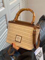 Uniqlo New Fashion version Handwoven bags 2023 new trendy solid color handbags summer versatile crossbody bucket bag niche straw bag