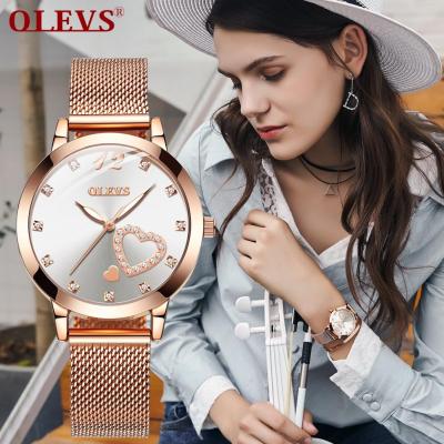 OLEVS Original นาฬิกาสำหรับผู้หญิงแฟชั่นลำลองนาฬิกาสตรี Milanis ข้อมือสแตนเลสสตีลนาฬิกาสีดำสีขาว