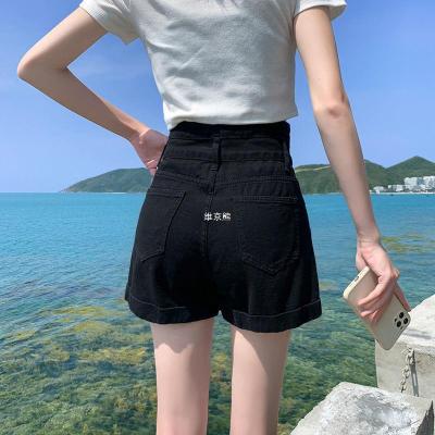 กางเกงขาสั้นสีดำกางเกงขาสั้นผ้ายีนส์เอวสูงผู้หญิงฤดูร้อนรุ่นใหม่ทรงหลวมดูผอมแนววินเทจ a กางเกงขาสั้น ins ร้อน