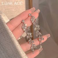 Original s925 silver needle long crystal tassel earrings 2023 new trendy niche design round face slimming earrings for women