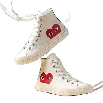 Converse with heart hot sale on side