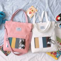 ifashionbagshop(IF1042) -c2กระเป๋าผ้าสะพายเป้ได้fashionลายเส้นด้านหน้า