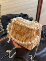 Uniqlo New Fashion version Woven straw bag womens 2023 new fashion niche design pearl shoulder messenger bag high-end handbag