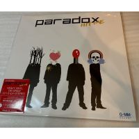 แผ่นเสียงรวมเพลงฮิต Paradox พาราด๊อกซ์ อัลบั้ม hit me รวมเพลงดังของพาราด็อก ไว้มากมาย เช่น ฤดูร้อน ทาส เพ้อ เพลงสุดท้าย