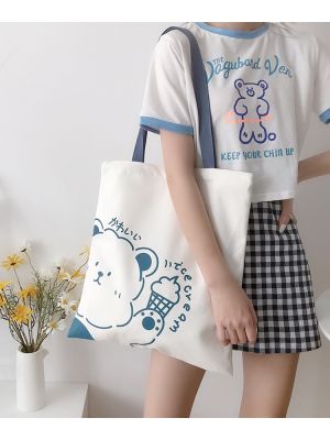 koreafashionshop(KR1599) -N1กระเป๋าผ้า สะพายข้าง มีซิป ผ้าแคนวาส สกรีนลายน้องหมี