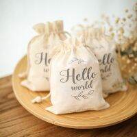 20pcs50pcs Hello Word White Cotton Birthday Party Linen Drawstrings Gift Baby Toy Packaging Bag Baby Gift Party Supplies