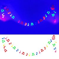 1ชิ้นของตกแต่งโน้ตดนตรีแบนเนอร์โน้ตดนตรีแสง UV สีดำธงประดับงานเลี้ยงโต้ตอบได้ธีมดนตรีตกแต่งวันเกิดปาร์ตี้ร็อคดาว