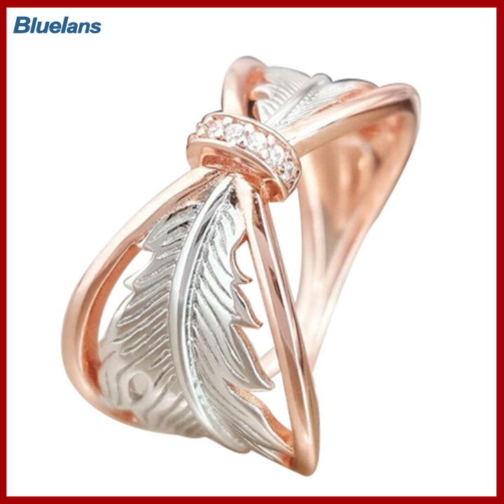 Bluelans®เครื่องประดับแหวนใส่นิ้วฝังพลอยเทียมขนนกแบบกลวงสองสีสำหรับผู้หญิงแฟชั่น