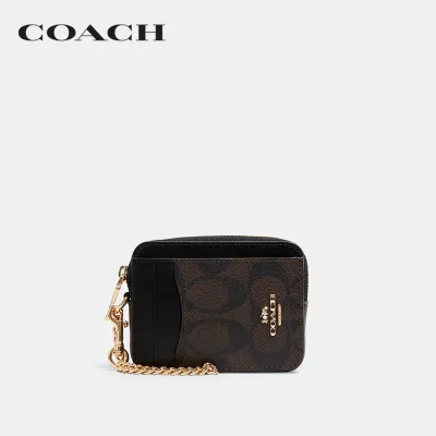 COACH ที่ใส่การ์ดผู้หญิงรุ่น Zip Card Case In Signature Canvas สีน้ำตาล C0058 IMAA8