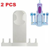 卍✽₪ 2 pcs Adhesive Electric Toothbrush Holder Wall Mounted Tooth Brush Heads Rack Organizer For Oral B For Bathroom Kitchen Storage