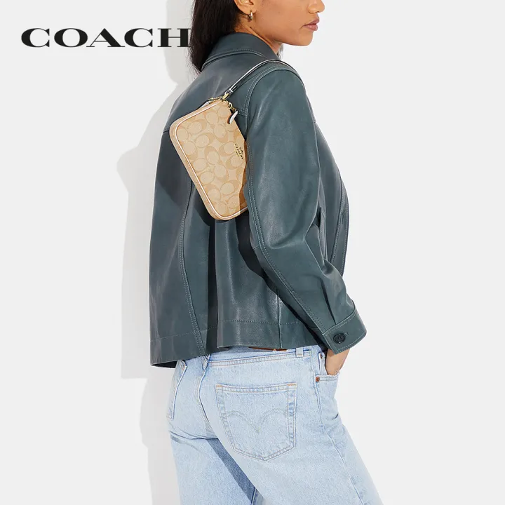 coach-กระเป๋าคล้องมือผู้หญิงรุ่น-nolita-19-in-signature-canvas-สีครีม-c3308-imdqc