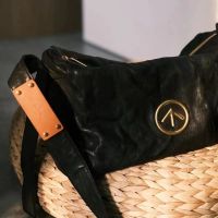 2023 New Fashion version GROTTO Japanese Second-hand Bag Black Stone Pillow Bag Wrinkled Leather Sheepskin Shoulder Messenger Womens Bag Arrow Bag