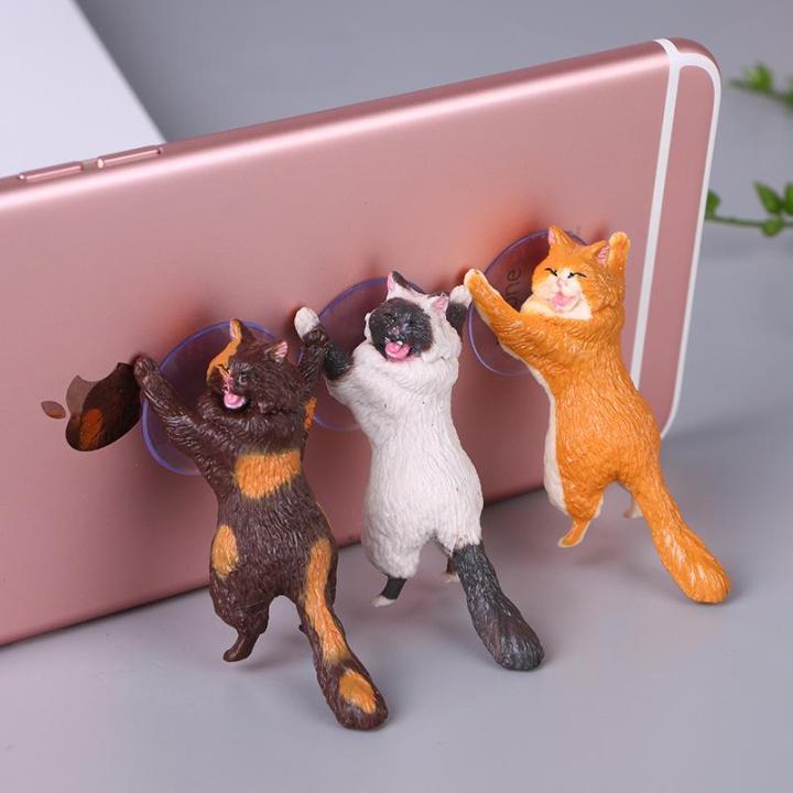 Bạn đang tìm kiếm một giá đỡ điện thoại độc đáo? Hãy xem hình ảnh giá đỡ điện thoại hình mèo này. Hình dáng mèo ngộ nghĩnh sẽ khiến bạn muốn sử dụng giá đỡ liên tục.