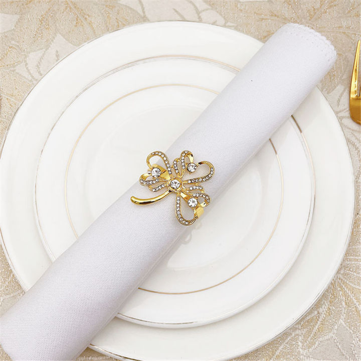 ใบไม้โลหะผ้ากันเปื้อนงานแต่งงานงานเลี้ยงทรงกลมที่ใส่กระดาษเช็ดปากสีทองได้ห่วงรัดผ้าเช็ดปาก