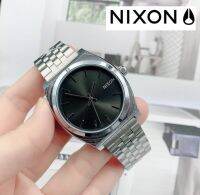 นาฬิกาข้อมือ NIXON​  นาฬิกาสายเลส​ ปรับสายเลื่อนได้ - ระบบ analog​ - ขนาด​หน้าปัด​ 38​ mm สินค้ามีถ่าน ผ้าเช็ค ถุงผ้าแถมให้นะคะ