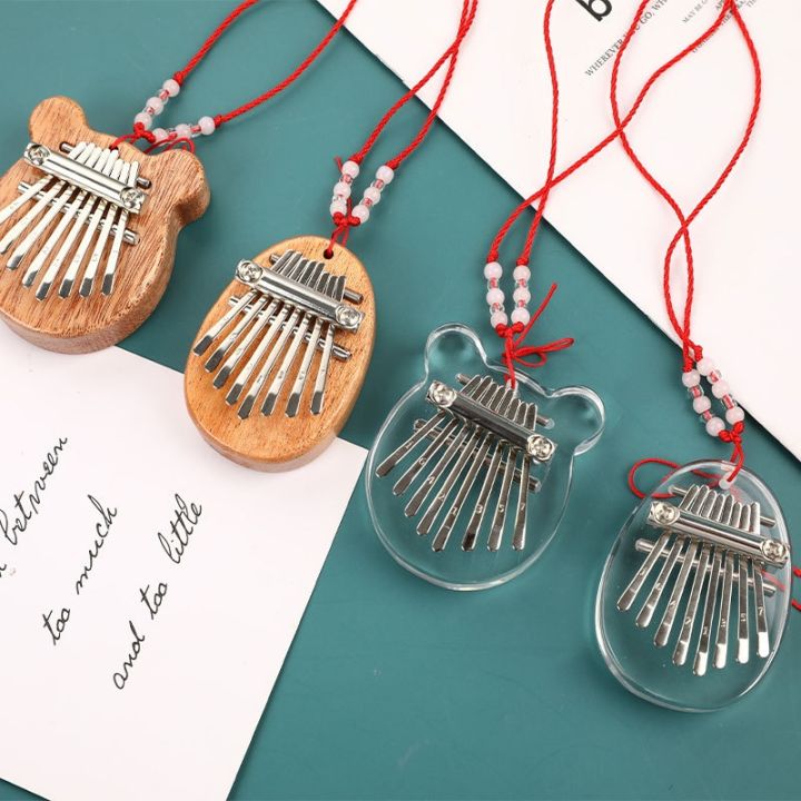 yf-8-keys-kalimba-thumb-small-wearable-musical-instrument-pendant-adult-kids-gifts