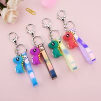 Creative cartoon soft plastic dinosaur doll key chain magic color stripe leather rope lovers bag small gifts pendant wholesale